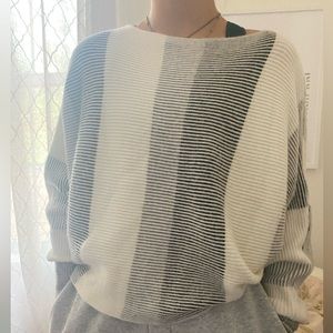 black white and gray sweater